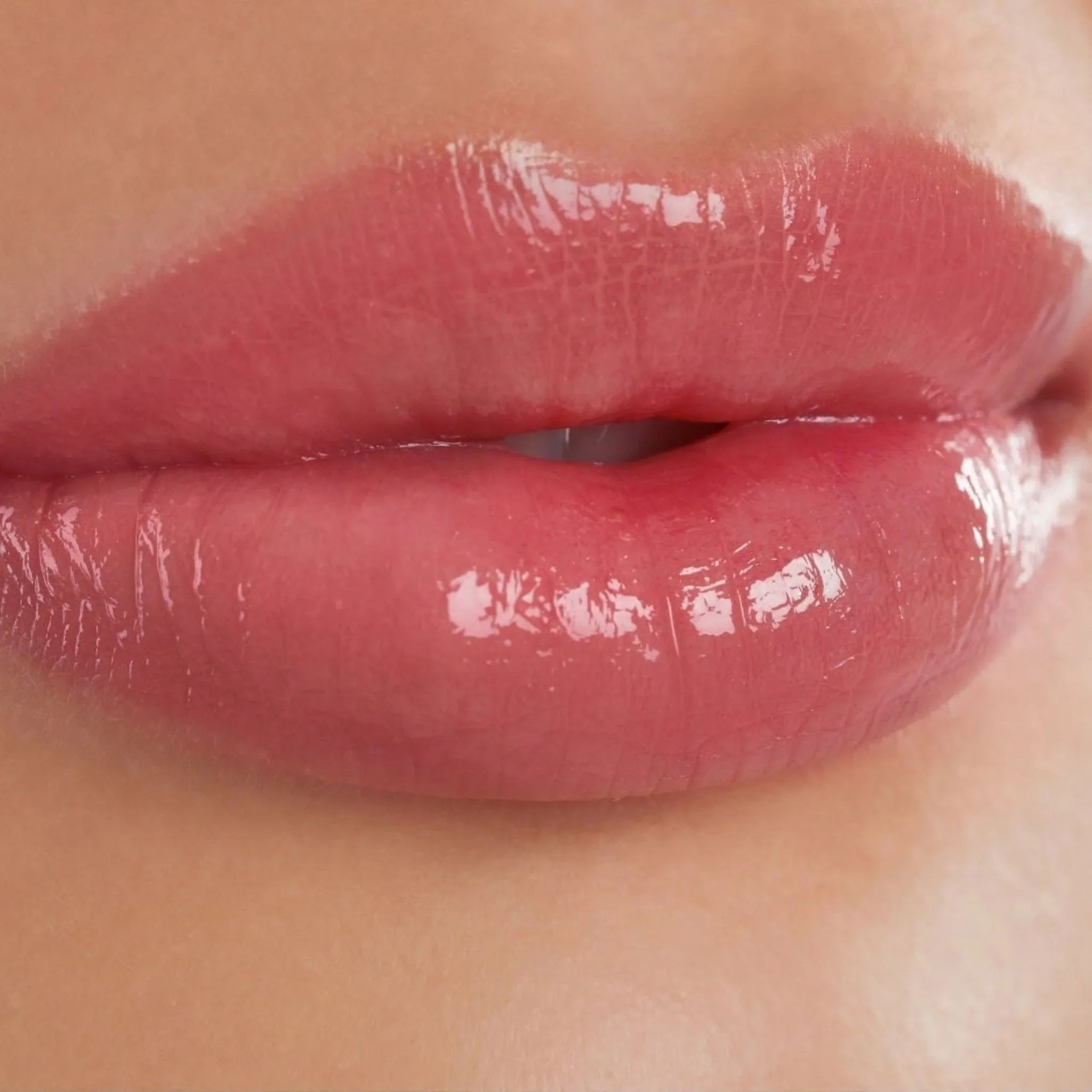 Skincare products including serum, face mask, and moisturizer on bathroom shelf.
