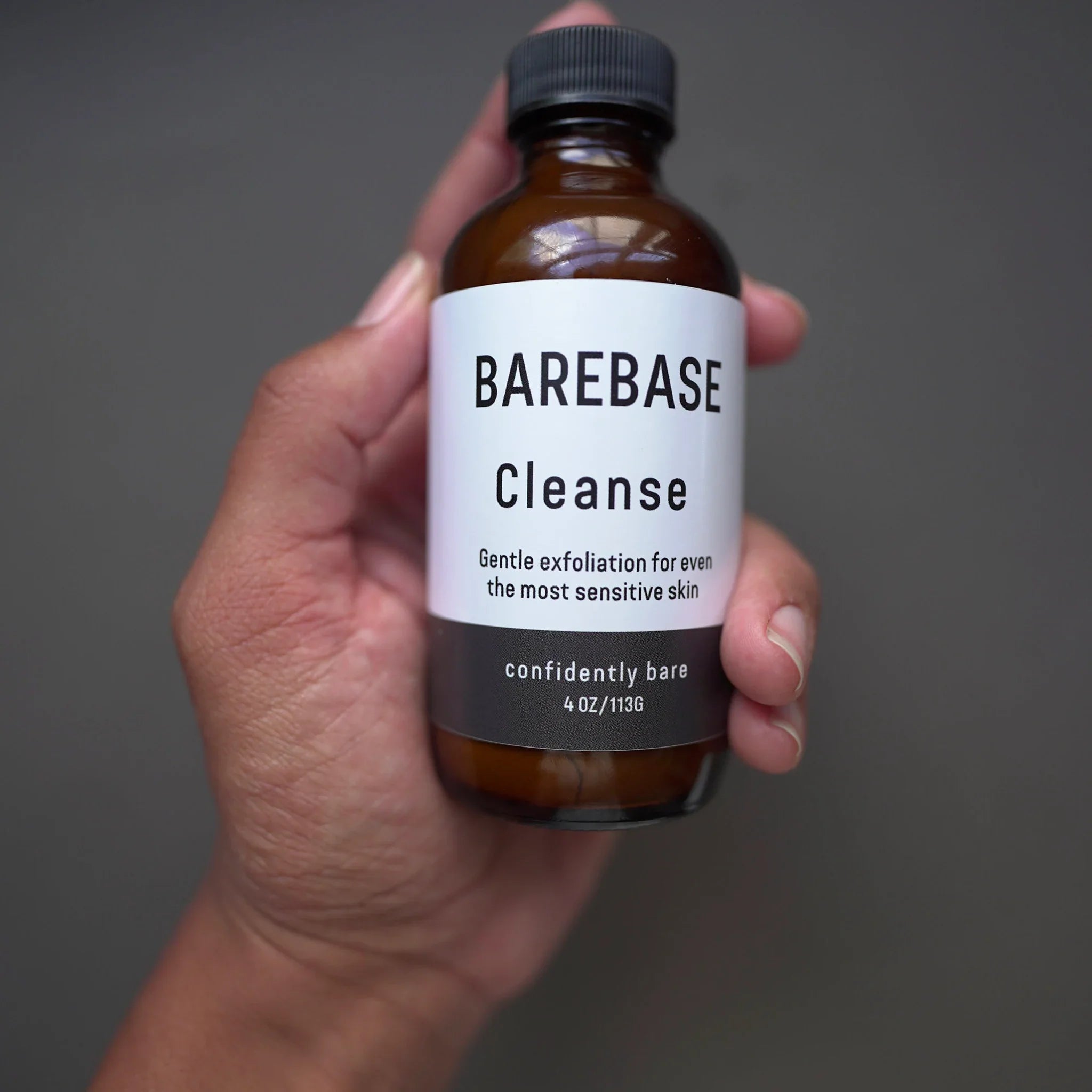 applying foaming facial cleanser to remove makeup and impurities.