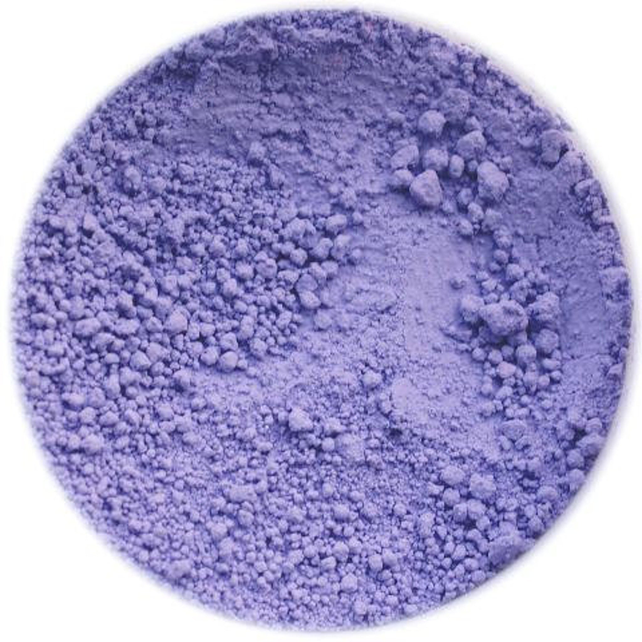 Close-up of matte African purple eyeshadow pan with smooth pressed powder texture in black compact