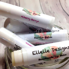 Lip balm tubes with white paper labels, "Ellelle Designs" and "Har-Lo Balm" text, for lip care
