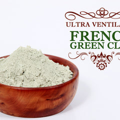 French Green Clay powder in a wooden bowl, light green powder, brown bowl, white background