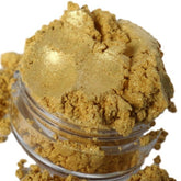 Eyeshadow shimmer makeup, gold color, metallic texture, in clear jar