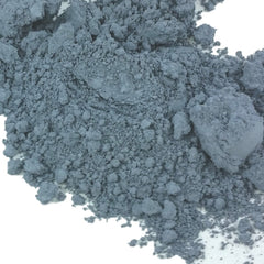 Gray powder with a rough, granular texture and a light, white background