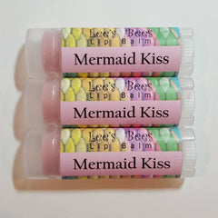 Lip balm tubes with pink, clear, and patterned labels, Lee's Bees brand, Mermaid Kiss flavor