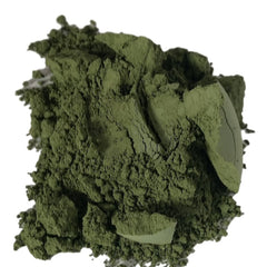 Side view of matte green tea eyeshadow pan showing smooth powder texture and vegan mineral makeup details