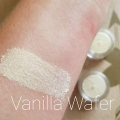 Close-up of ivory light lemon cream shimmer eyeshadow in a 5ml sifter jar with mineral mica finish