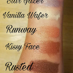 Side view of ivory light lemon cream shimmer eyeshadow in 5ml sifter jar with mineral mica texture