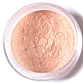 Eyeshadow powder rose gold shimmer loose powder in clear plastic container
