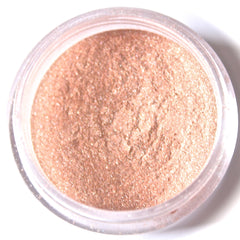 Eyeshadow powder rose gold shimmer loose powder in clear plastic container