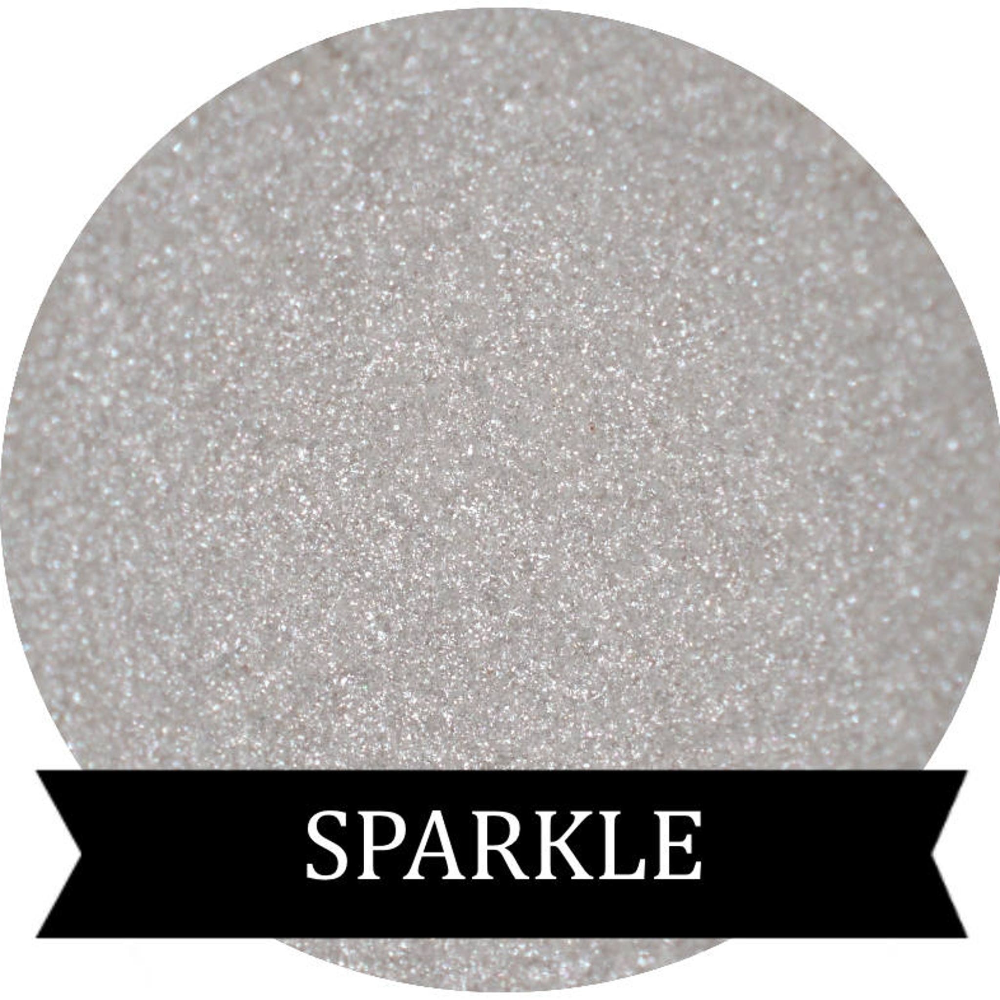 Sparkle eye shadow, silver glitter texture, black banner with "SPARKLE" text
