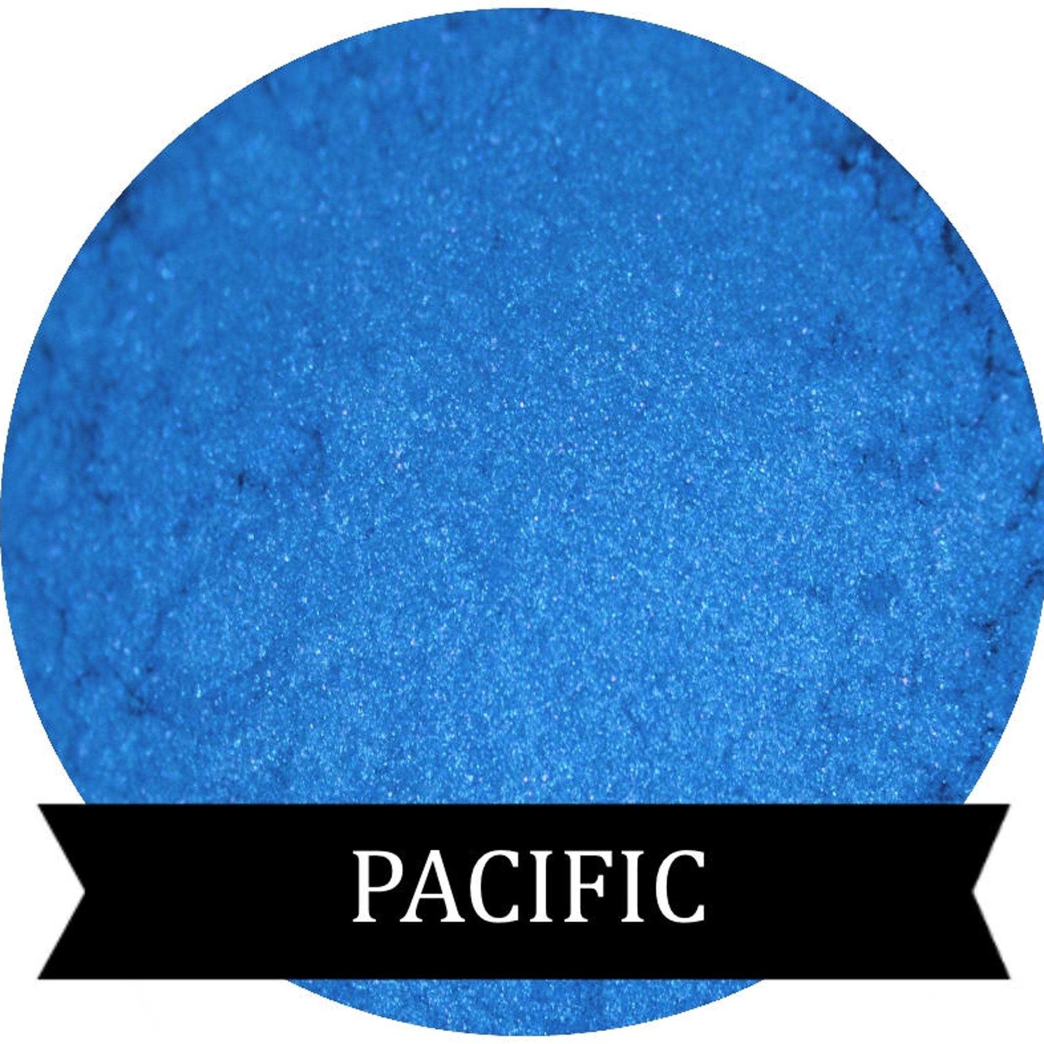 Eye shadow, bright blue powder, PACIFIC brand on black ribbon