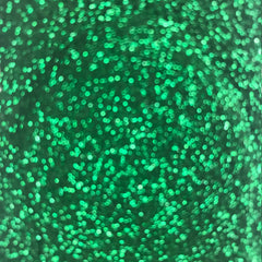 Green glitter background with bokeh effect and sparkling texture