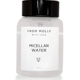 Micellar water bottle with black cap and white label, From Molly With Love brand visible