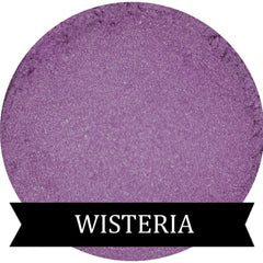 Close-up of wisteria pastel purple pressed powder eyeshadow in compact case with soft matte finish