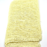 Natural agave cactus fiber exfoliating washcloth with textured weave on bamboo hook, beige tones, eco-luxury skincare accessory