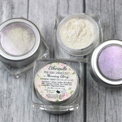 Shimmer dust in clear jars with silver lids, white and purple iridescent colors, Etherealle brand