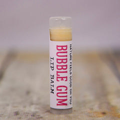Lip balm tube with clear cap, white label, and Bubble Gum text in pink font