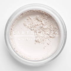 Mineral eye shadow compact in soft vanilla shade with smooth matte finish and minimalist packaging