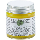 Facial Cleanser in yellow glass jar with silver lid, Leafology branding visible