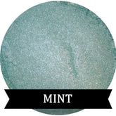Single pan of mint green eyeshadow with soft matte finish in sleek black compact