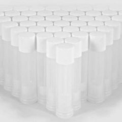 Clear plastic lip balm tubes with white caps, arranged in a group