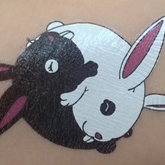 Detailed close-up of 60s Flower Power Daisy Chain Temporary Tattoos for Festive Skin Art