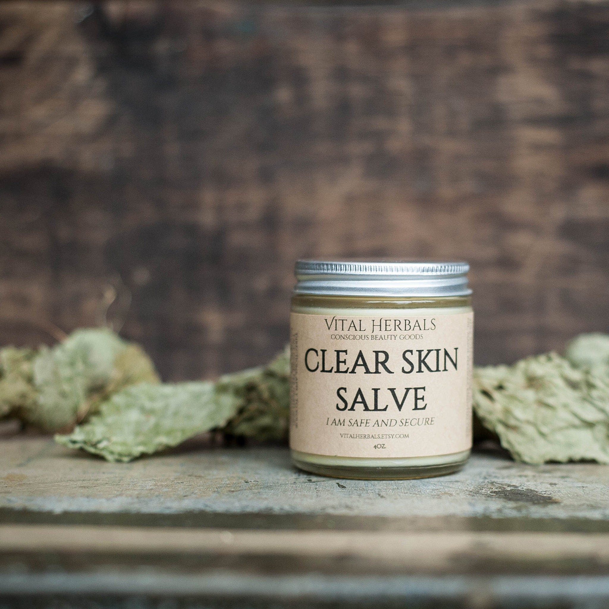 White tube of acne treatment balm with teal accents, showcasing a matte finish and clean skincare aesthetic