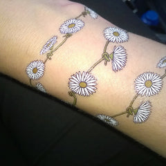 Usage example of 60s Flower Power Daisy Chain Temporary Tattoos for Festive Skin Art