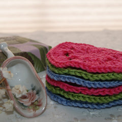 Facial cleansing pads, stacked, multi-colored crocheted cotton rounds, spa accessory