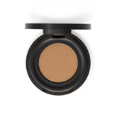 Close-up of vegan bamboo eyeshadow palette with matte and shimmer shades in earthy tones