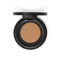 Close-up of vegan bamboo eyeshadow palette with matte and shimmer shades in earthy tones