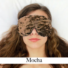 Sleep mask in mocha brown velvet, worn by person, with "Mocha" text below
