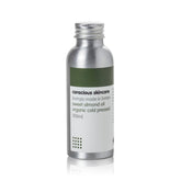 Organic Almond Oil bottle, silver metal, white label with text "conscious skincare