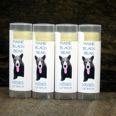 Lip balm tubes with white labels, black bear image, and Maine Black Bear text in blue font