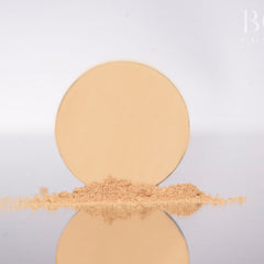 Close-up of matte yellow eyeshadow pan with smooth pressed powder texture and clean edges