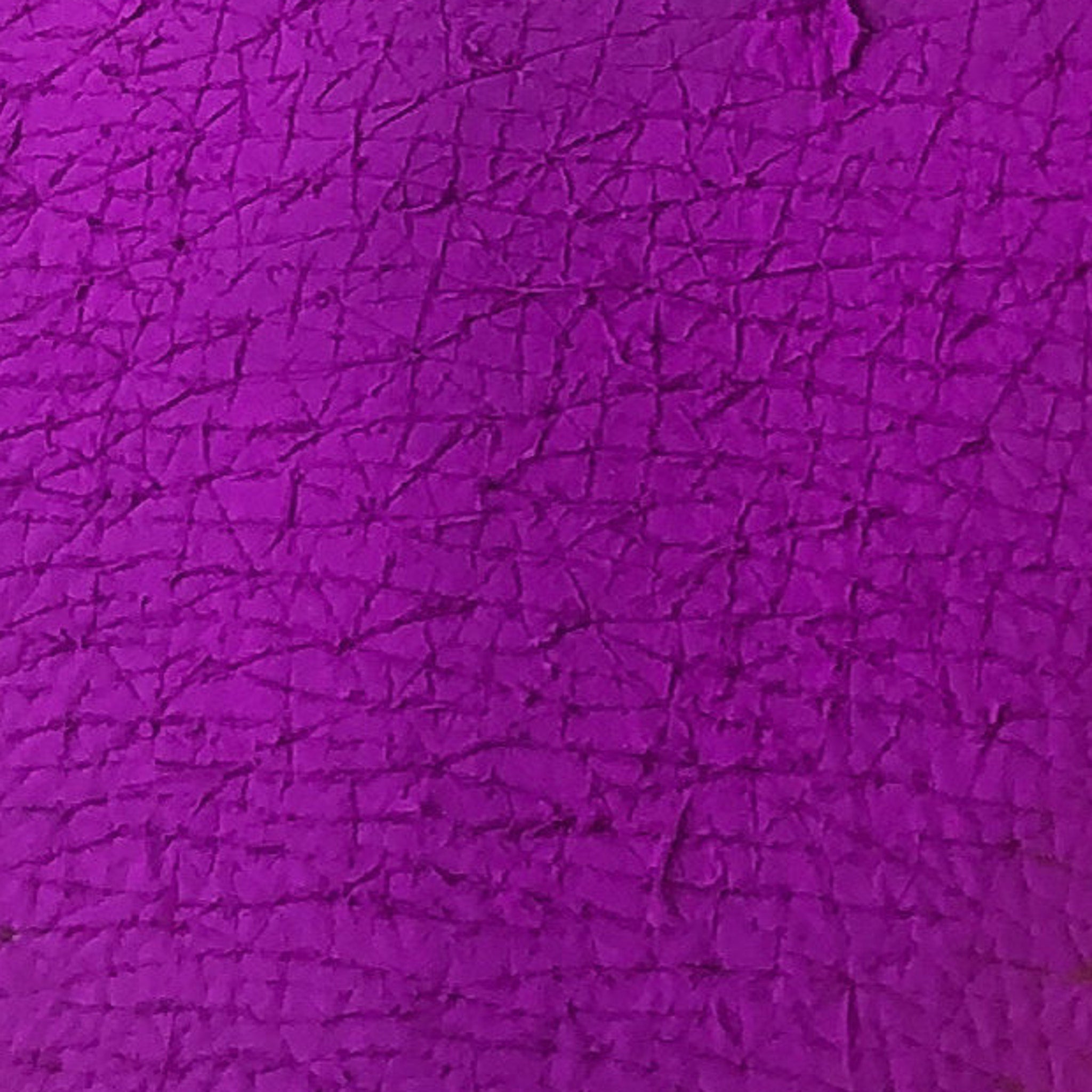 Eye shadow purple textured surface with dark lines and pattern
