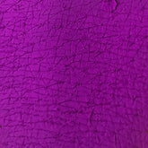 Eye shadow purple textured surface with dark lines and pattern