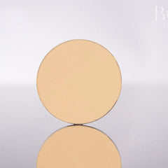 Single pressed matte eyeshadow pan in vibrant Greek Isles yellow with smooth texture and round 37mm compact