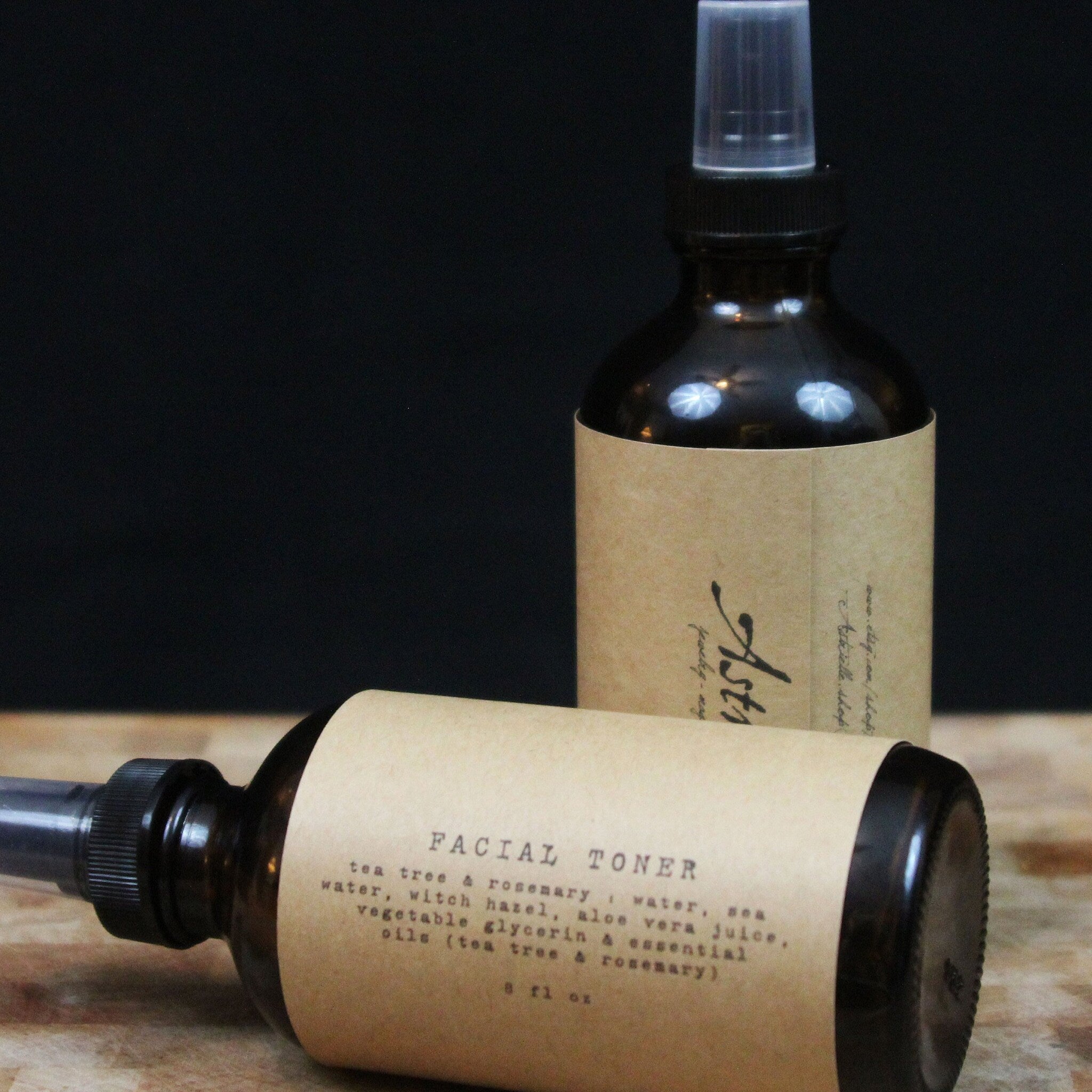Facial toner spray bottles, brown glass with tan labels, Kathryn Arielle brand
