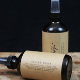 Facial toner spray bottles, brown glass with tan labels, Kathryn Arielle brand