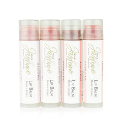 Lip balm tubes with pink, red, and clear tints, Wild Jasmine brand, for lip care