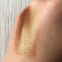 Side view of Tala Copper Eye Shadow Pigment in BR2 shade, showcasing rich metallic finish in 2ml container