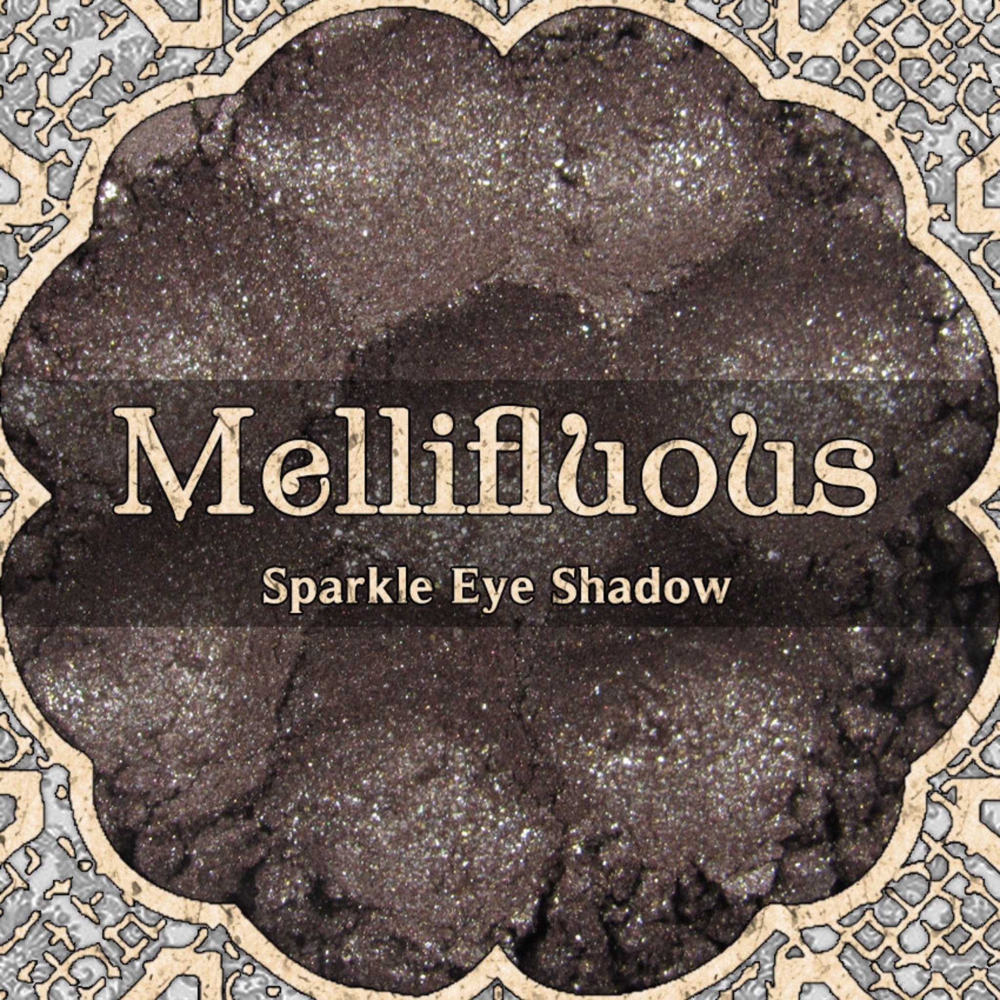 Eye shadow with dark brown color and silver sparkle, Mellifluous brand name included