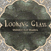 Eye shadow shimmer powder with grey and green duochrome in Looking Glass brand design