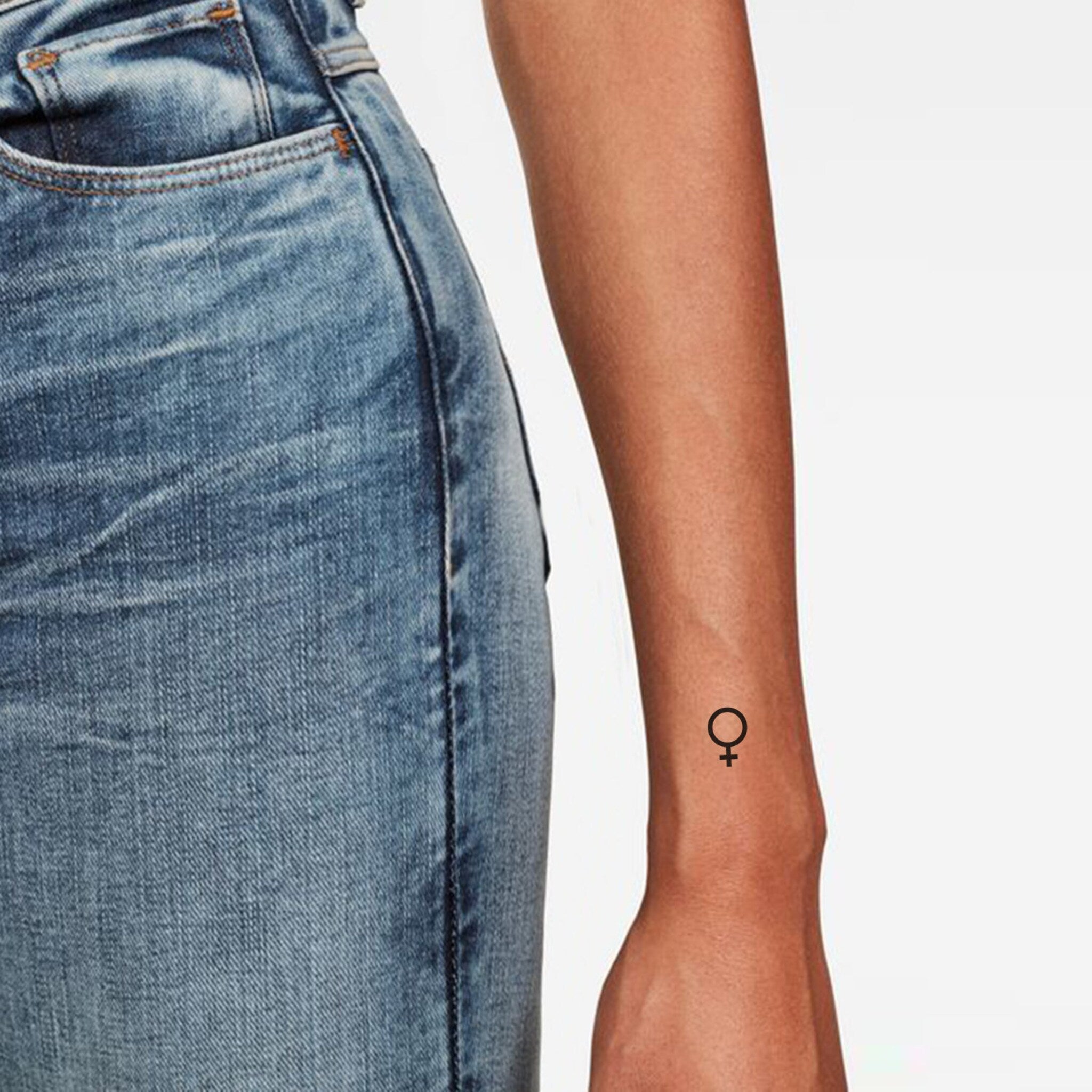 Set of delicate Venus symbol temporary tattoos in skin-safe packaging with minimalist design