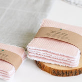 Makeup remover pads, pink waffle weave cotton, stacked on wood with LinenForest label