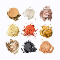 Eyeshadow powder in various colors, including gold, red, and black, with a metallic finish, scattered on white background