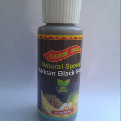 Dark amber glass bottle of African black soap liquid cleanser with minimalist gold label