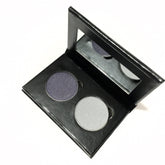 Eye shadow duo with dark gray and light gray colors in a black palette with a mirror