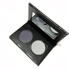 Eye shadow duo with dark gray and light gray colors in a black palette with a mirror